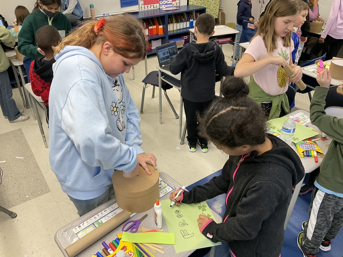 _hase1's tweet photo. First graders are busy making leprechaun traps with their buddies today! #lane126 https://t.co/s8CyltHojD