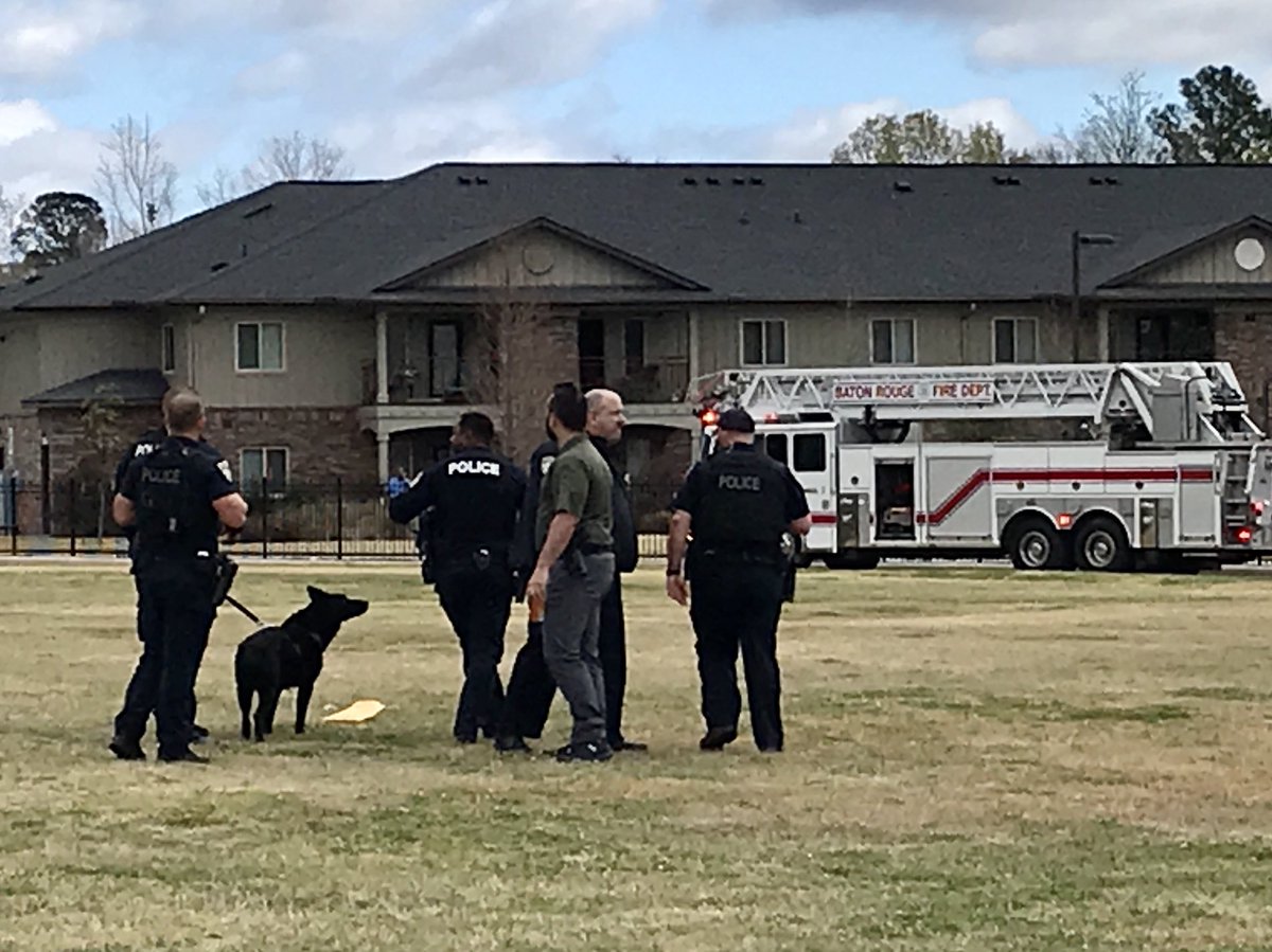 A Baton Rouge police dog prepares to go on search for the missing infant, just off Harding Boulevard at Cypress Road, Wednesday, March 15, 2022