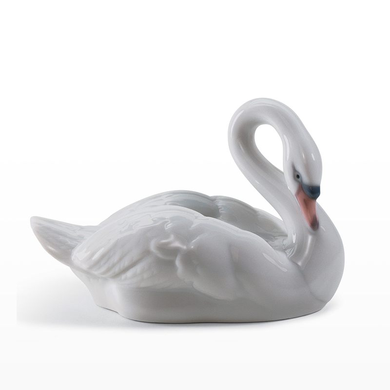 The_Chinashop's tweet image. This Lladro piece is a porcelain figurine depicting an elegant swan as it swims along. Delicate touches of orange and black add the final details to the swan, giving it a lifelike quality. ow.ly/CJ7e50Igcnr

#Lladro #Elegant #Swans #Animals #Home #Decor #Gift #Giftideas