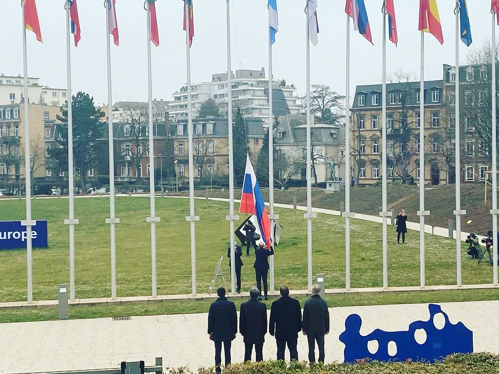EerikNKross's tweet photo. As of today Russia is expelled from the Council of Europe. Flag coming down now. Last time something like this happened was the expulsion of the USSR from the League of Nations for agression against Finland in 1939. https://t.co/kgpQ3cHiHD