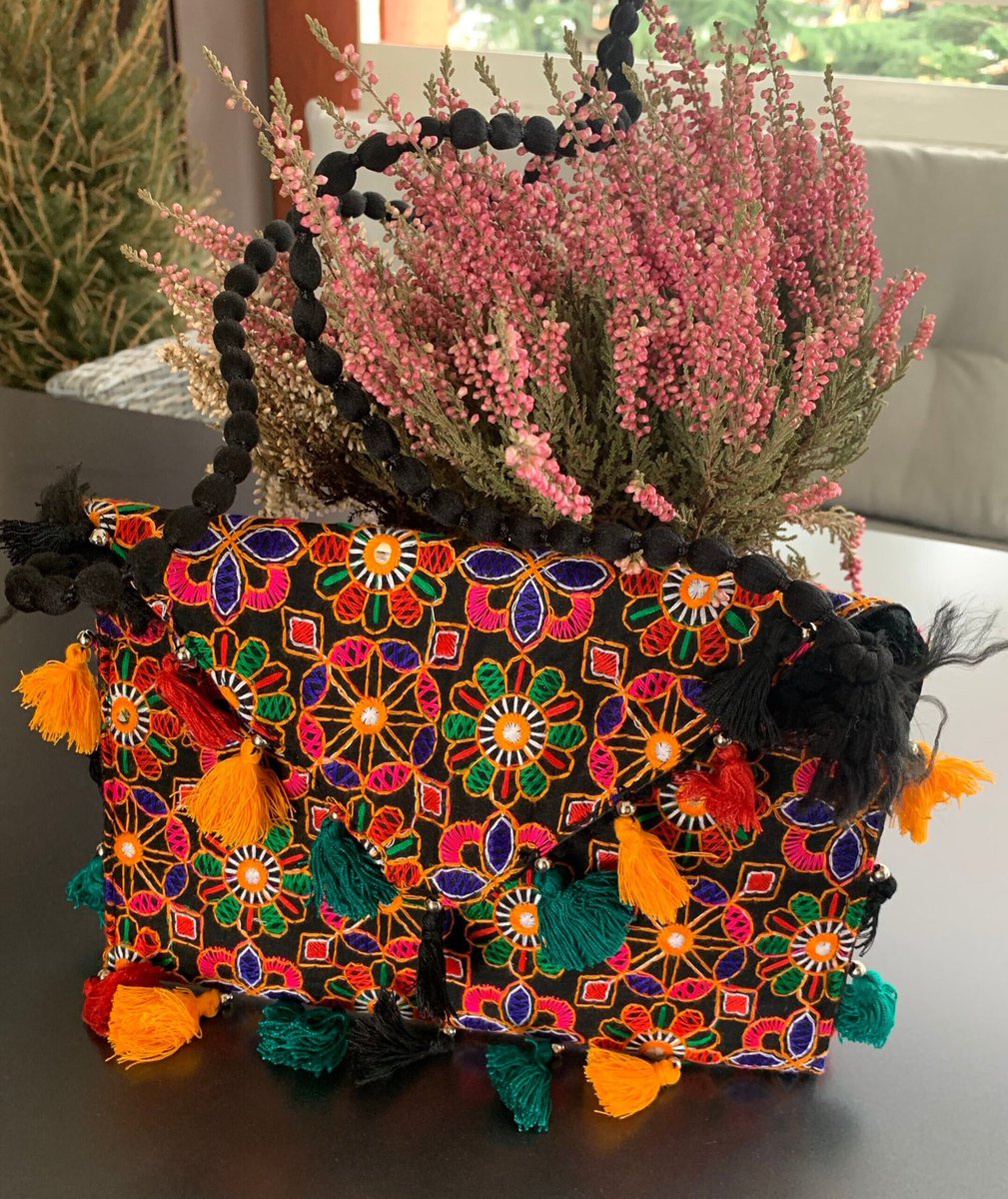 amicaSstudio's tweet photo. Excited to share this item from my #etsy shop: handmade black with colourful Embroidery clutch bag/ purse / clutch with handmade sling in black #black #bohohippie #crossbody #handmadeclutch #bohoclutch #handmadebag #handwork #artisansmade #clutchbag https://t.co/SivLU3UkqW https://t.co/N2EvpHfinF