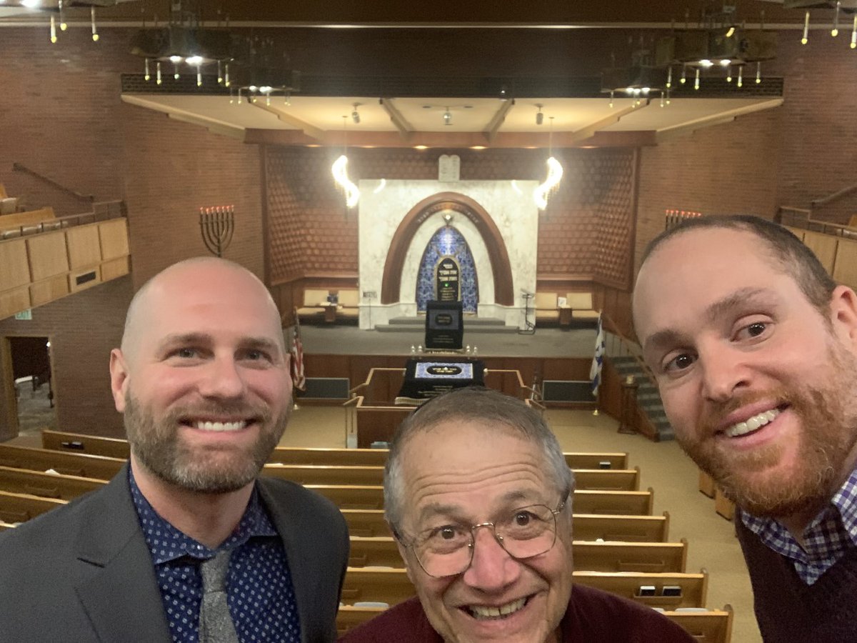 Dozler stands with Rabbi Ben Hassan and Cantor Emeritus Al Maimon of the Sephardic Bikur Holim Congregation.