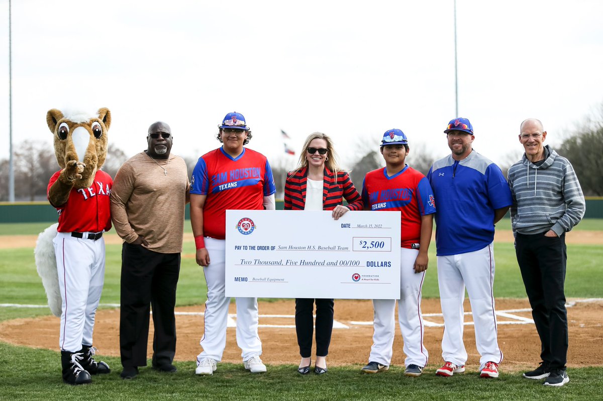 RangersCare's tweet photo. Yesterday, the Texas Rangers Baseball Foundation presented a check for $2,500 to the Sam Houston High School Baseball team. https://t.co/E7P3f2a0RS