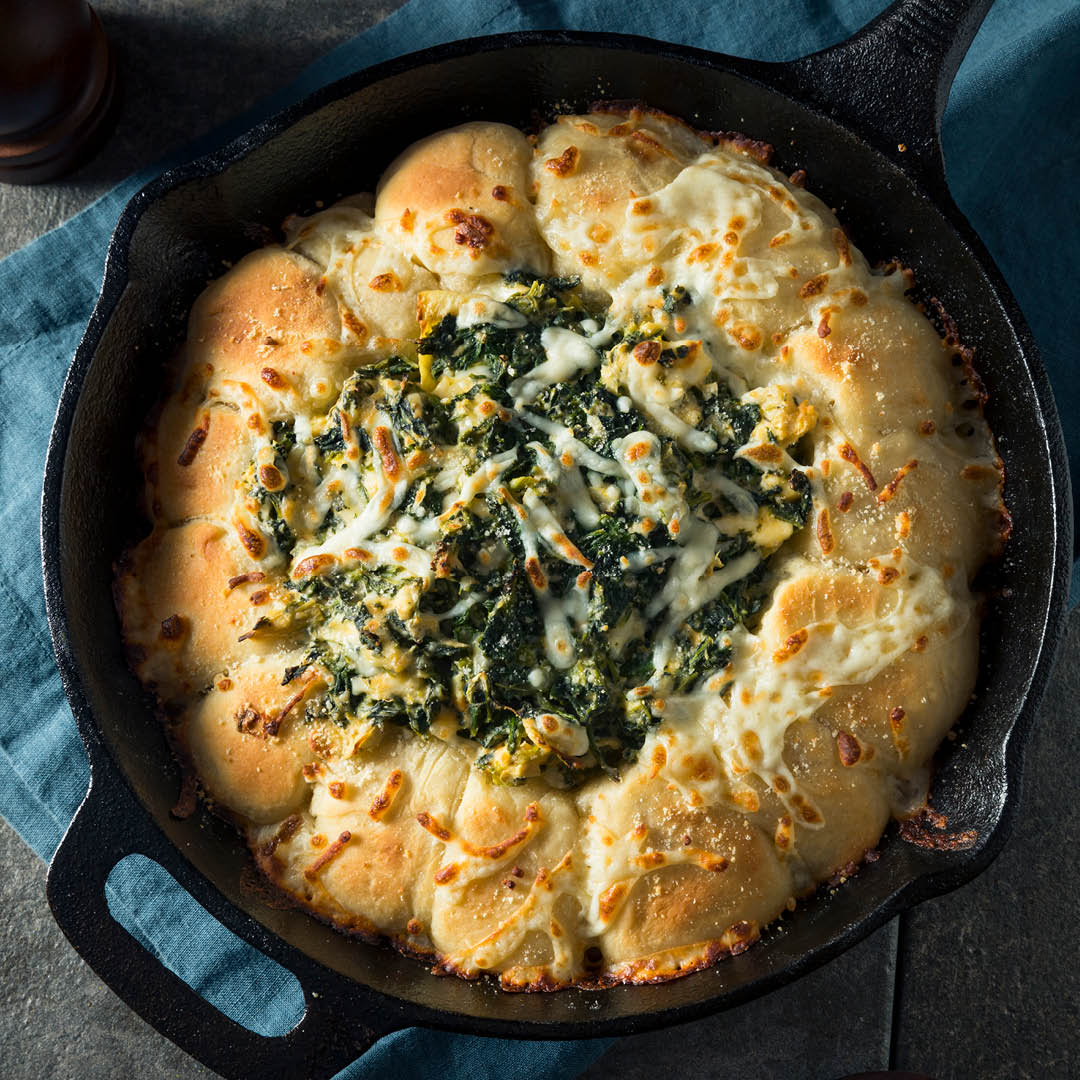 Today is Artichoke Day, a time to celebrate a food so tenacious it doesn't quit until you eat its heart. Celebrate the day by making creamy artichoke dip, adding artichoke hearts to your pizza, shaving them onto a salad or pairing grilled artichokes with garlic aioli.