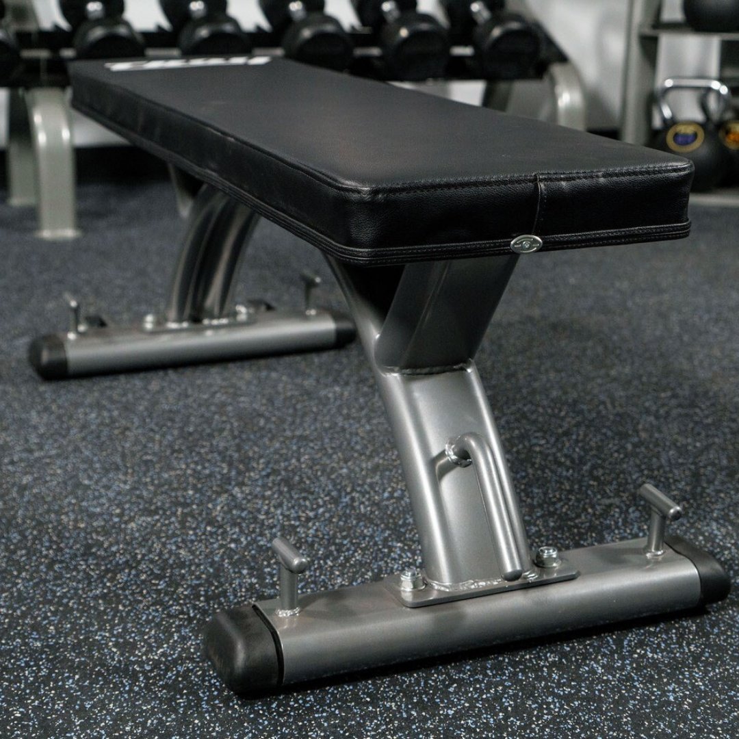 Troy_Barbell's tweet photo. The Troy Fitness Commercial Flat Bench features premium styling combined with comfort for enjoyable daily use. With its comfortable pad, rubber feet and end caps to protect floors, this bench extends the comfort to your facility space.

#TrainTroy https://t.co/J6PO1OhKa8
