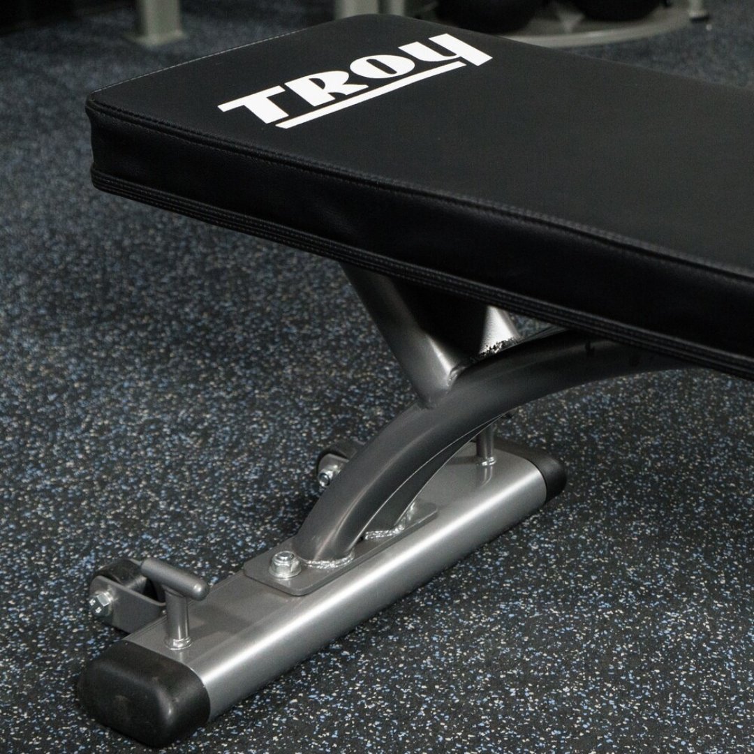 Troy_Barbell's tweet photo. The Troy Fitness Commercial Flat Bench features premium styling combined with comfort for enjoyable daily use. With its comfortable pad, rubber feet and end caps to protect floors, this bench extends the comfort to your facility space.

#TrainTroy https://t.co/J6PO1OhKa8