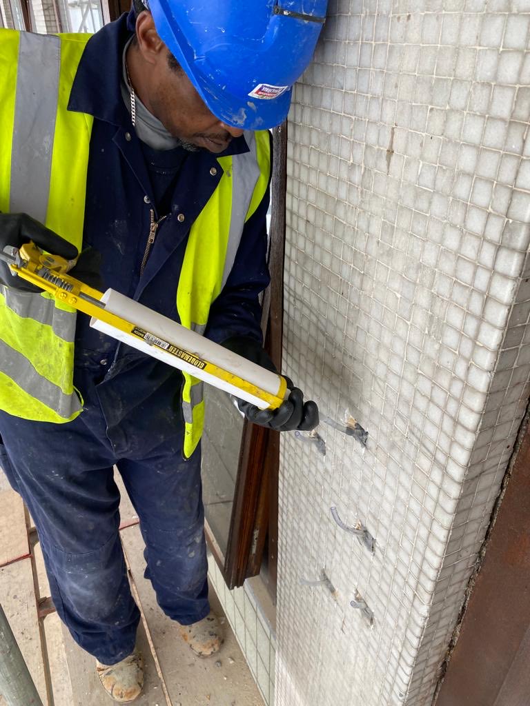 Stabilising debonded render and mosaic tiling at Imperial College London, South Kensington. Fosroc Nitofil, low viscosity resin, injected under hand pressure to fill any voids/fissures. #RepairReinstateRestore ⁦<a href="/FosrocUk/">Fosroc UK</a>⁩ ⁦<a href="/SCAlliance3/">Alliance</a>⁩