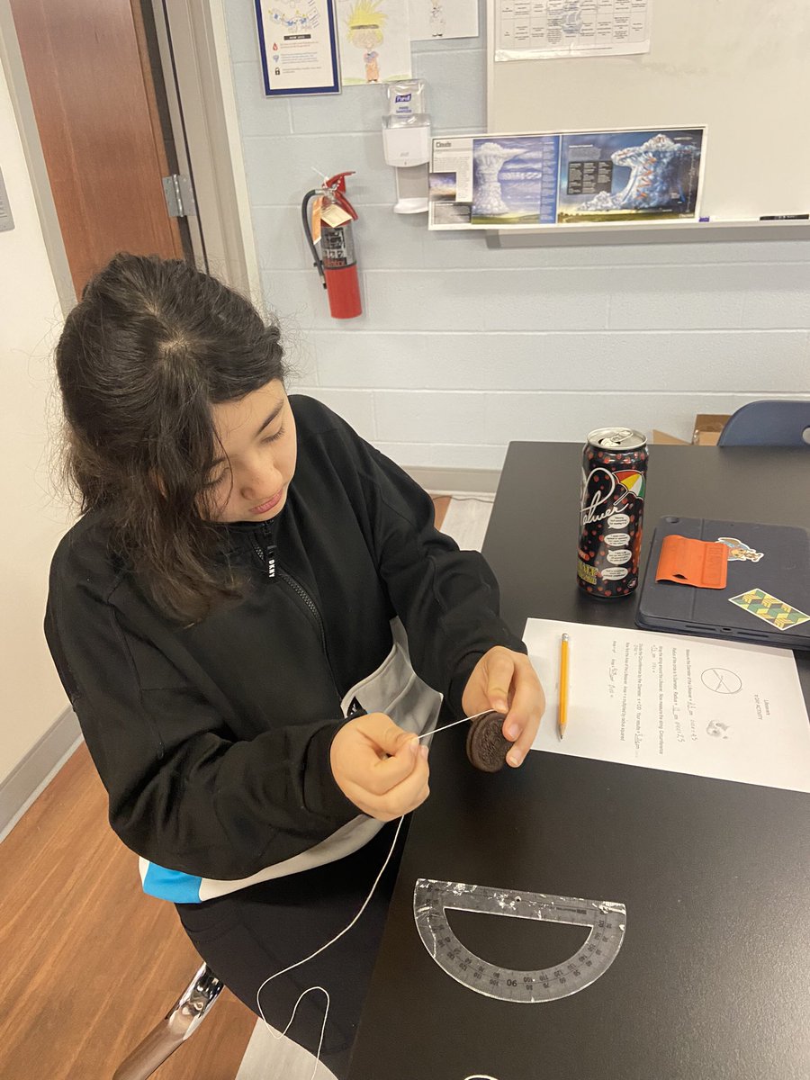 7 Navigators investigating Pi with Lifesavers, Oreos and bubbles <a href="/hudsonohHMS/">Hudson Middle School</a>