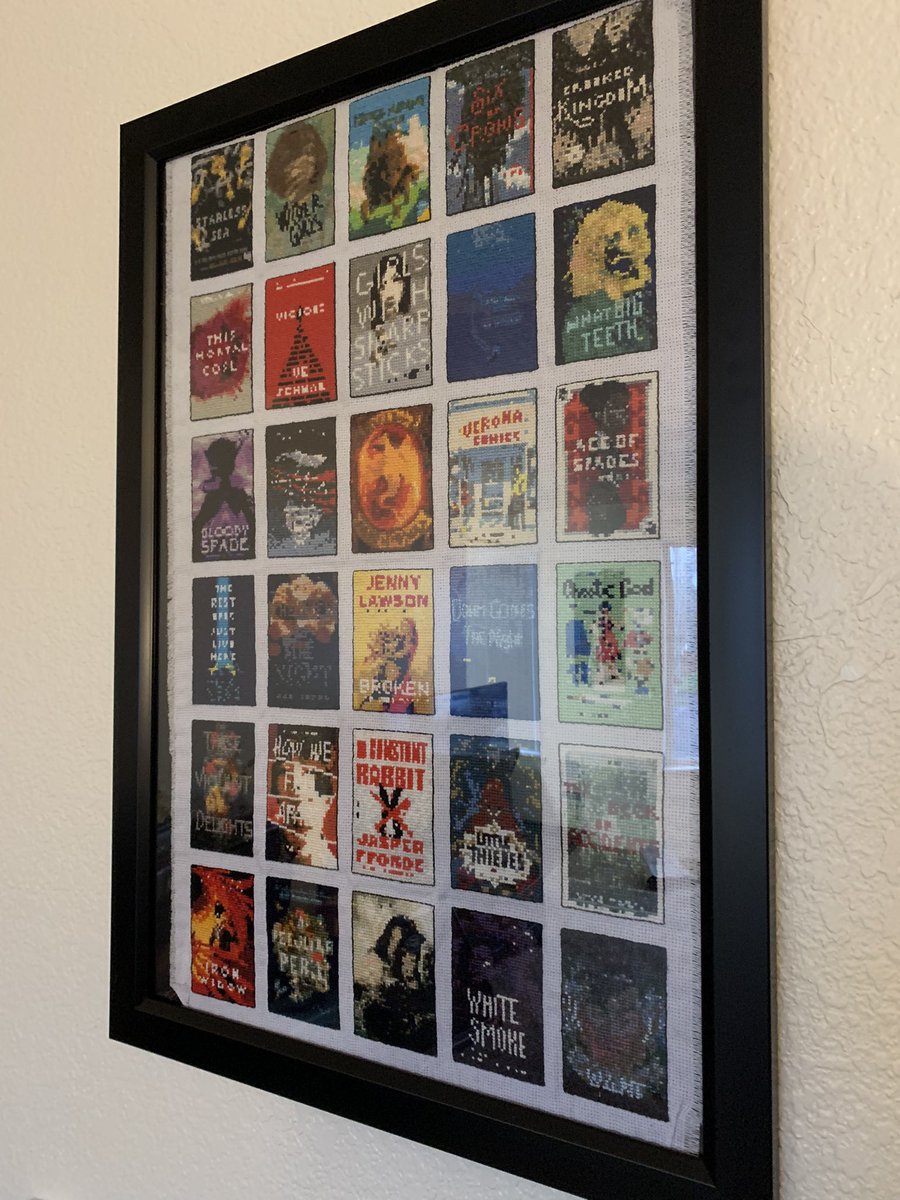 It’s finally hung up! 1 year of reading, in cross stitch. 🥰