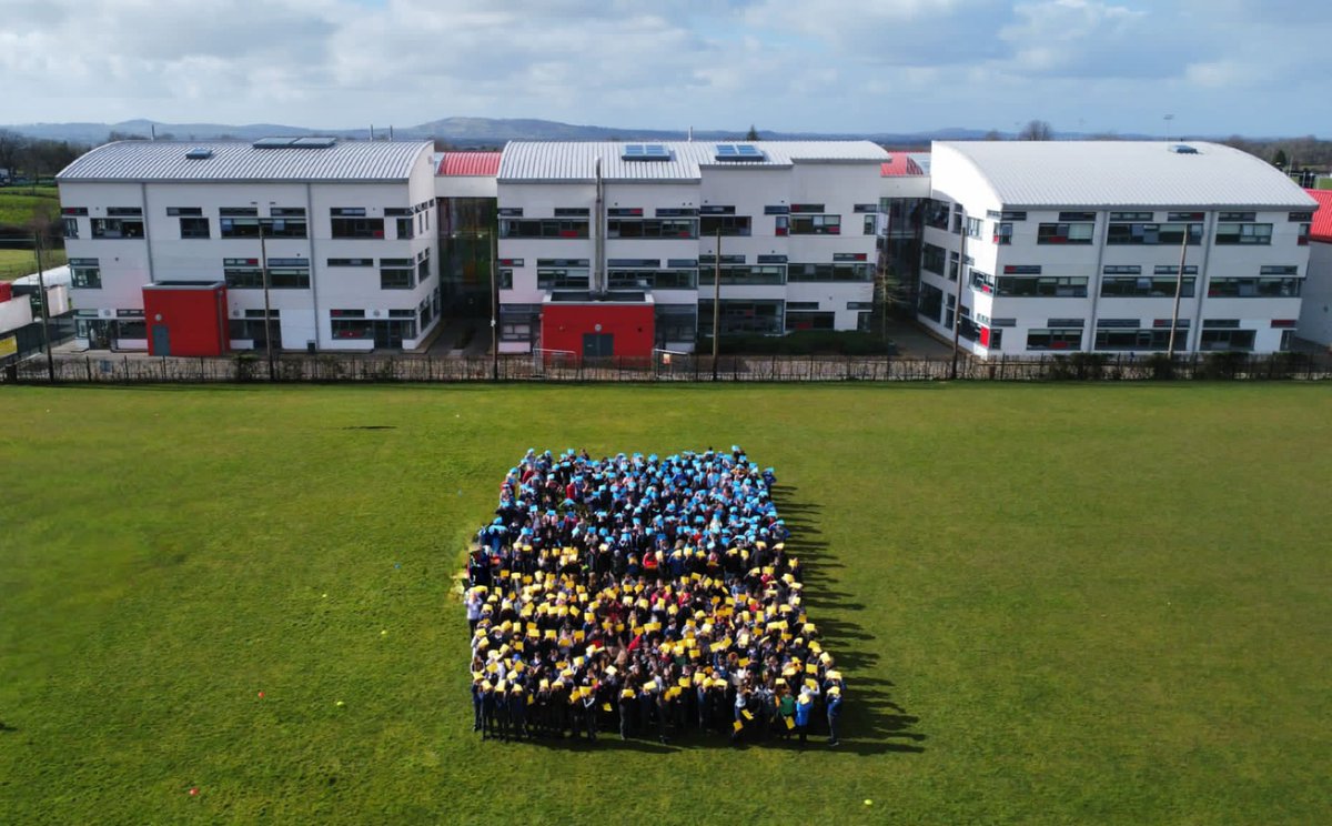 Well done to all involved in recreating the Ukrainian flag on the school pitch today. Ukraine we stand with you. <a href="/STNDoon/">Scoil na Tríonóide Naofa</a>