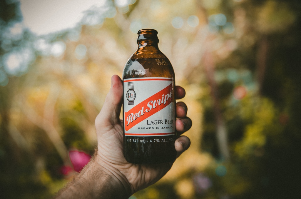 GreenBookVacay's tweet photo. Popular in Jamaica, Red Stripe Beer was born and brewed in 1928 The very first Red Stripe was an ale that was much heavier and darker than today's Red Stripe. https://t.co/TwwexDEUYD