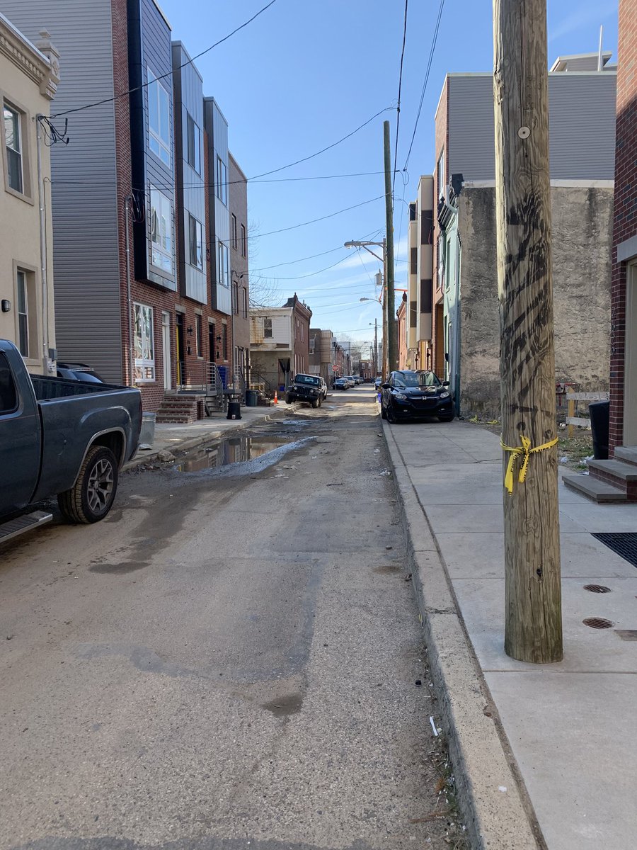 thinlizzie19's tweet photo. Hey @PhilaStreets and @PhilaParking how am I supposed to safely walk my child home? Street full of sinkholes and sidewalk full of cars? 🤔 2600 Latona block @bikelanesphilly @PhillyMayor https://t.co/SUc8t980PG
