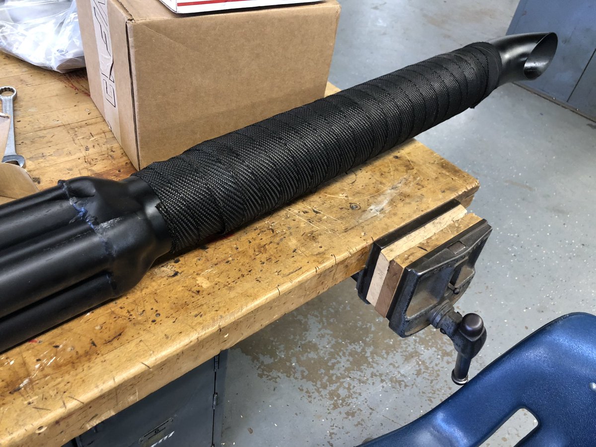 Bird and West got to work today wrapping the <a href="/FactoryFive/">Factory Five Racing</a> kit car exhaust pipes with some <a href="/DesignEngInc/">DEI - Design Engineering Inc.</a> wrap.  Hopefully this helps prevent the “snake bites” the exhaust pipes are known to give when passengers accidentally brush their legs against the hot exhaust.  #rowvastrong