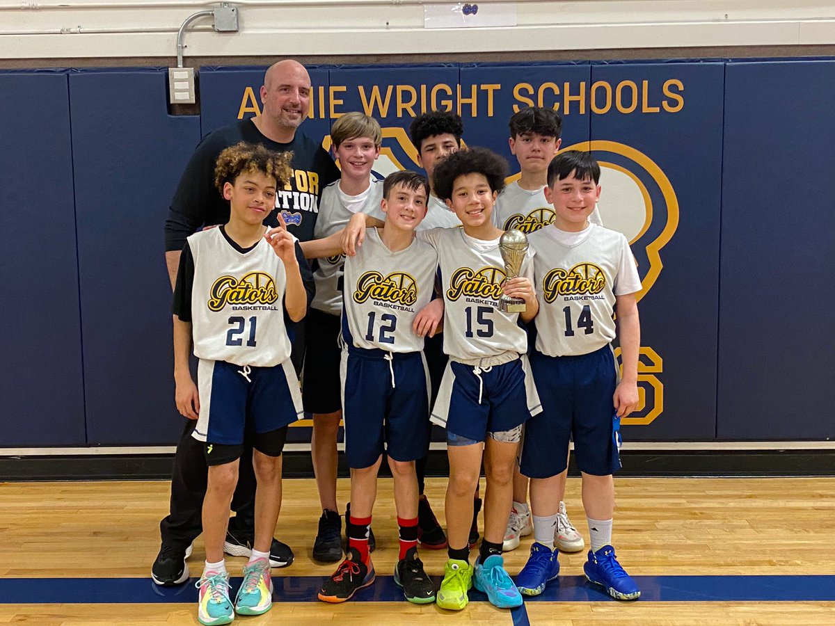 AnnieWright1884's tweet photo. Another Gator championship in the books! The Grades 5-6 boys team celebrate an undefeated season that ended with a big win tonight vs St Pat’s. Way to go, Gators! https://t.co/2WuJs39PCh
