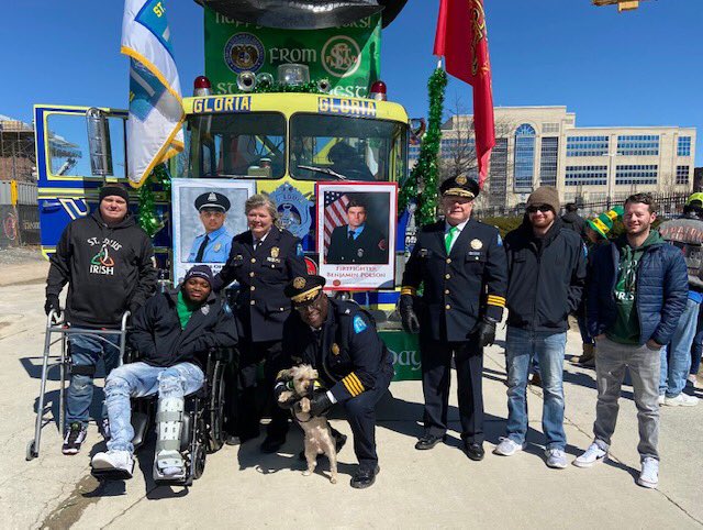 SLMPD's tweet photo. It was an honor &amp; a blessing to have our recently injured officers join us for the St. Patrick’s Day Parade this past Saturday! Special thanks to @SchickerFordSTL for donating trucks &amp; Joe Barbaglia and @thehillstlouis for decorating the fire truck. #SLMPDStrong #STL https://t.co/VlSCahHR5R