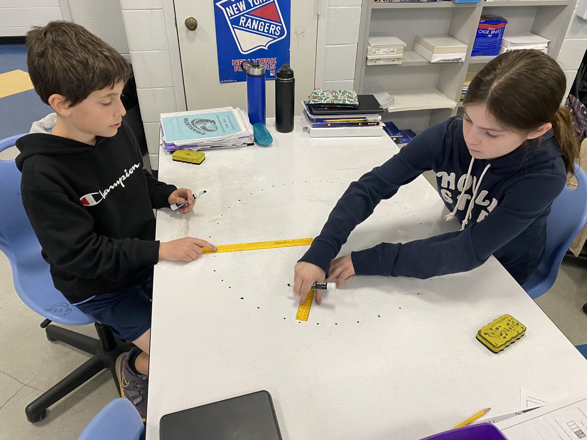 MrRusso_CRS's tweet photo. Making circles with a series of equidistant points.  Then checking out how Pi works with circumference and area. Happy Pi Day. #piday2022 #CRSMustangs https://t.co/XIagNPw8uF