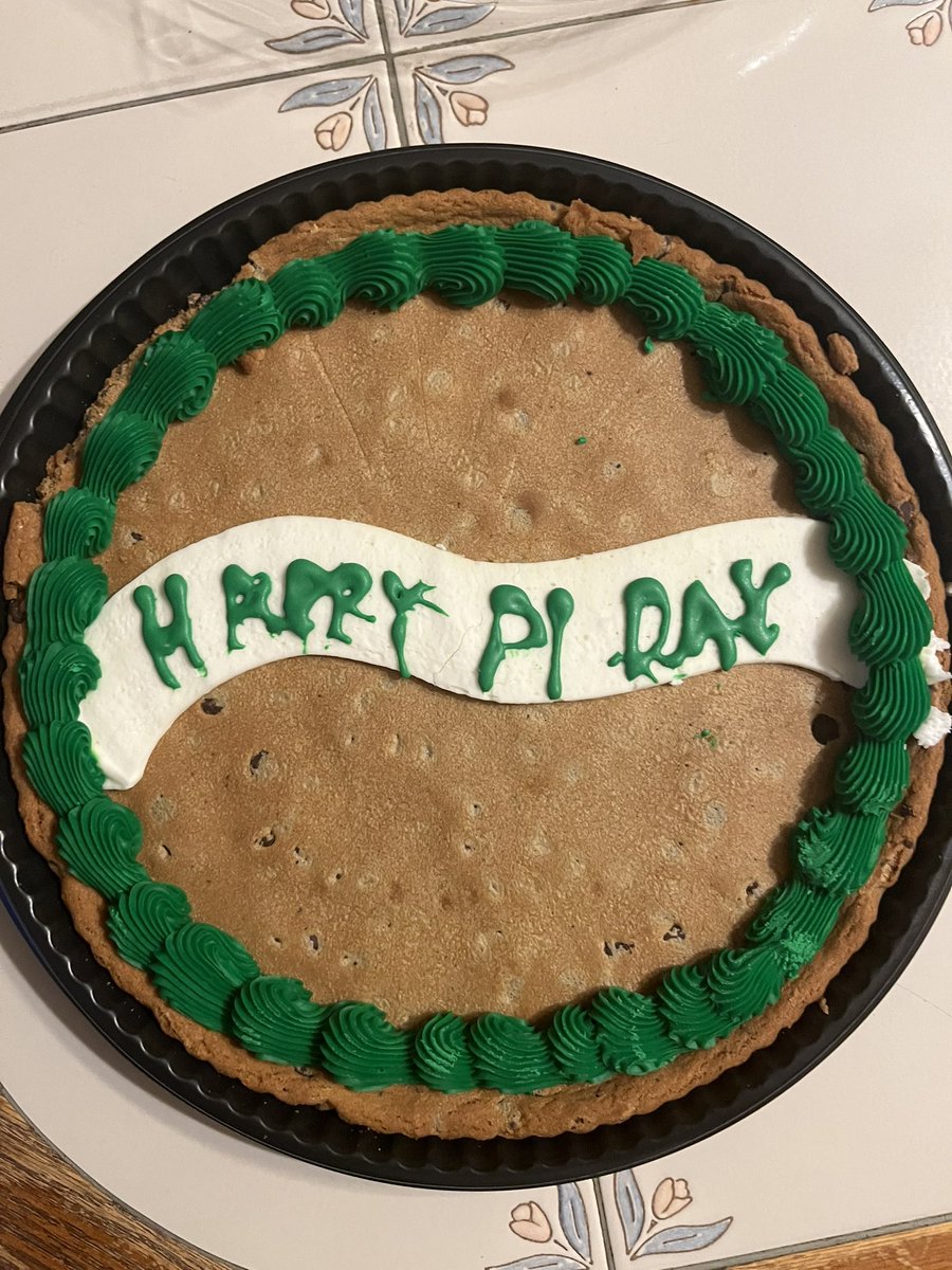 bibly_denise's tweet photo. Happy PI day!! David was to bring in something round to share.. so he choice a giant cookie.. he put the words on himself.. https://t.co/3rhCBOrPAX