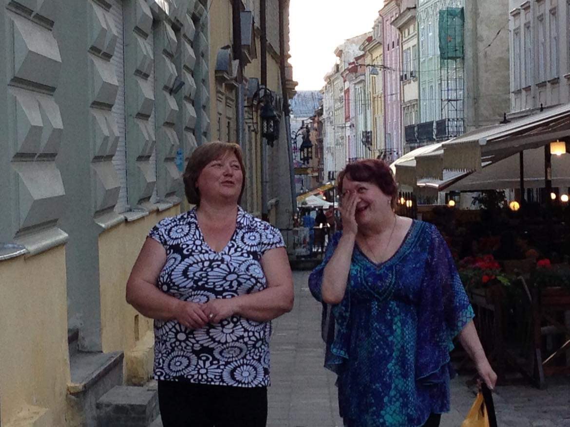 EliMcCann's tweet photo. I took this picture in western Ukraine in 2014. I don’t know these women. But I saw them walking by, laughing together, and I snapped this shot. This photo is Ukraine to me. https://t.co/z62U0PjWMt