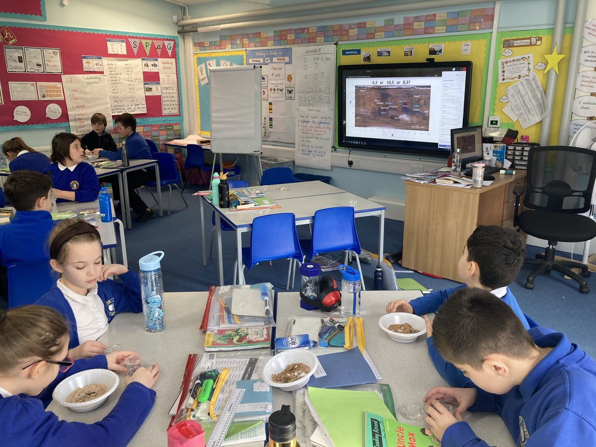 PotterStAcademy's tweet photo. Year Five searching for signs of life in their Mars rock sample #MarsDay22 https://t.co/wsp7gzX68C