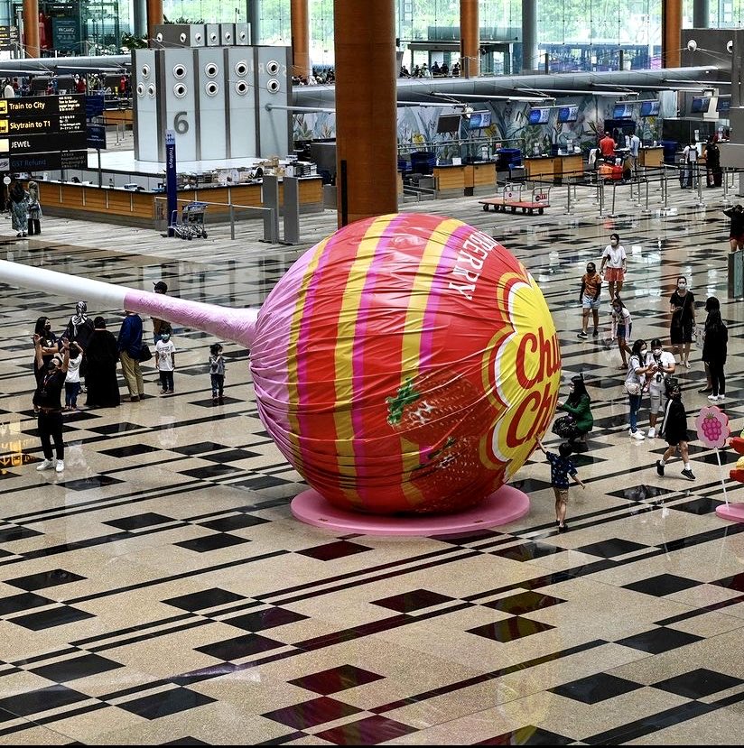 Saw the massive Chupa Chups lollipop installation at Changi Airport and learned the wrapper was designed by Salvador Dali in 1969 and has never been changed.