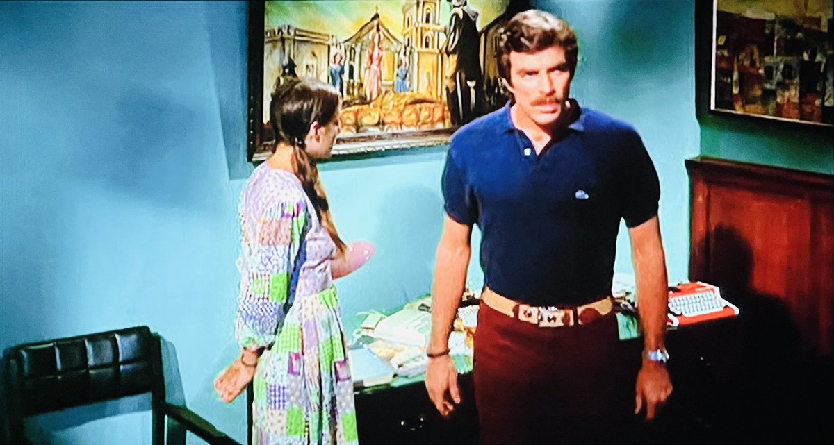 hellhoundharvey's tweet photo. Sharing this picture to confirm that Tom Selleck is indeed in the movie… in a blue Izod shirt, yellow belt, and red pants. Supergirl cosplay, or fashion hate crime? You decide. #DaughtersOfSatan https://t.co/eLMKH4e4BC