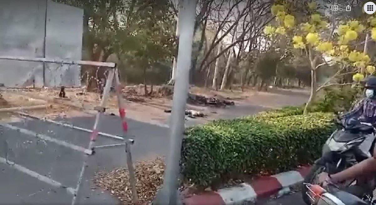 wolfy_ashy's tweet photo. 2 dead bodies were laying on the ground since last night till now. Junta doesn’t allow to retrieve the bodies &amp; bury them. The motorcycle was blasted &amp; burned &amp; they died on the spot. #WarCrimesOfJunta  #2022Mar15Coup #WhatsHappeningInMyanmar https://t.co/xSPu9HENKz