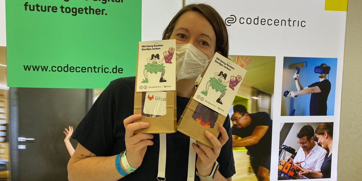 codecentric's tweet photo. Apropos Socken: Bei uns heißt es „Mit fancy Socken DevOps rocken!" 😎🤘
Unser Partner @gitlab hat uns mit nicen Strümpfen versorgt, die wir gern mit euch teilen. Softwerker Magazine haben wir natürlich auch am Stand, Ehrensache. Wer kommt rum?
#Javaland2022 #itconf #fancysocks https://t.co/oi6ZTcCfZi