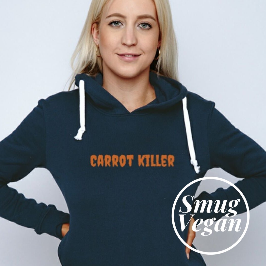 SmugVeganShop's tweet photo. Admit it. You’re a stone cold Carrot Killer. You probably even behead the little orange fellas and dismember them before drowning them in hummus. Comes in women's and men's cuts and hoodies and kids too: https://t.co/15bUKeqwAC https://t.co/GS13bEMF3f