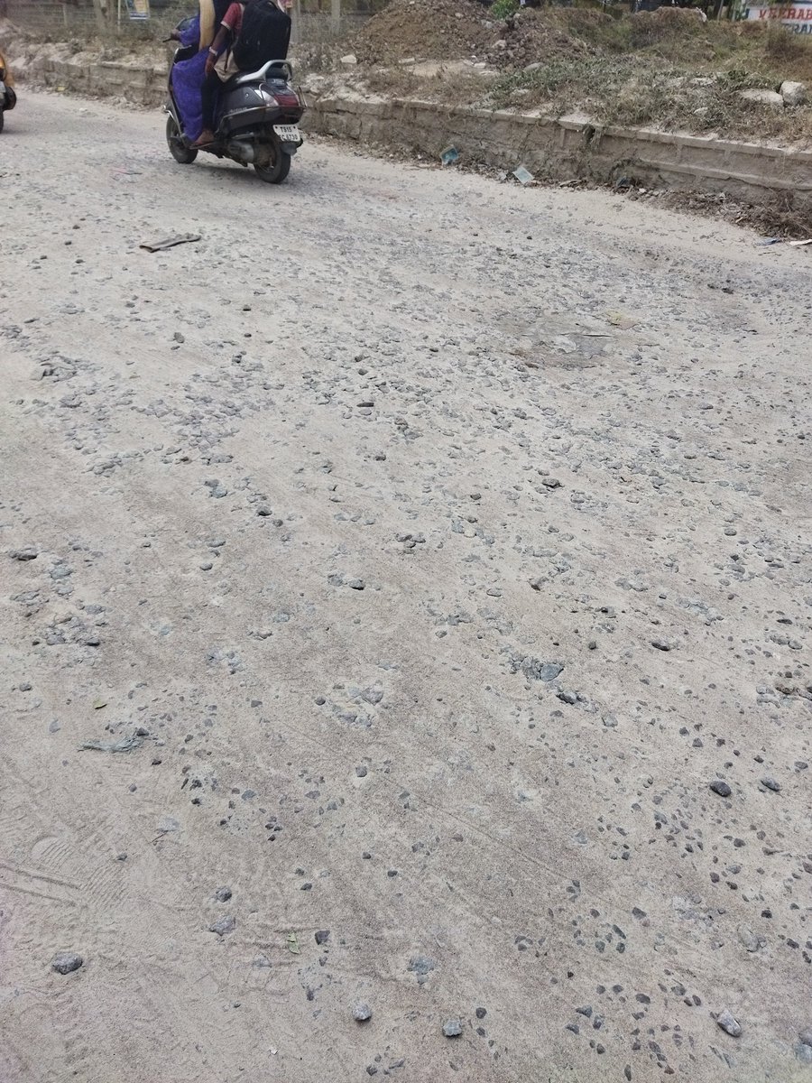 nareshv2's tweet photo. @KTRTRS,@GMRMLAPTC,@TRSGMR,@PanduThummala,@HMDA_Gov,@TelanganaCMO, the road is in the pic is from green field to symphony homes which comes under municipality. Road is in very dangerous condition. The people who are going on the road suffering alot with pot holes and dust. https://t.co/qk0Ab26CBW