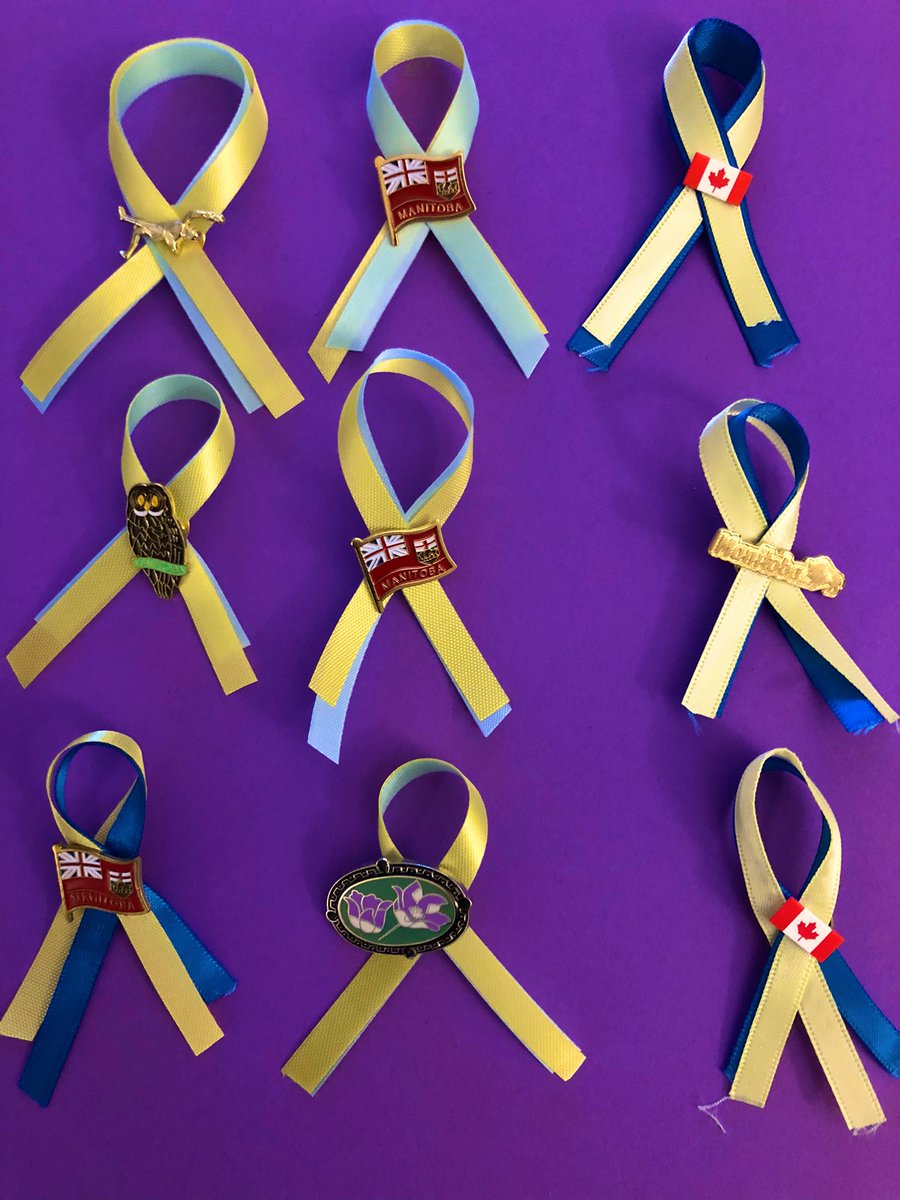 DariaSalamon's tweet photo. #StandWithUkraine ribbons made by Kildonan East @RETSDschools students available today! Thank you @Daniel_Blaikie  and @mattwiebeMB for donating pins! https://t.co/SkJ931NSI8