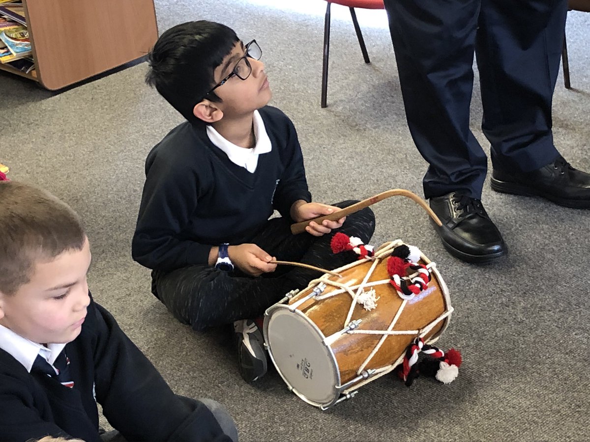 SoulsSchool's tweet photo. Year 3 had a wonderful morning with Mr. Singh @SFE_Tweets @SFE_MS. They learnt about the dhol drum. They learnt how to hold and use the tilli so it did not make a flat sound #dholdrum #musicweek https://t.co/KqJNWXjmjz