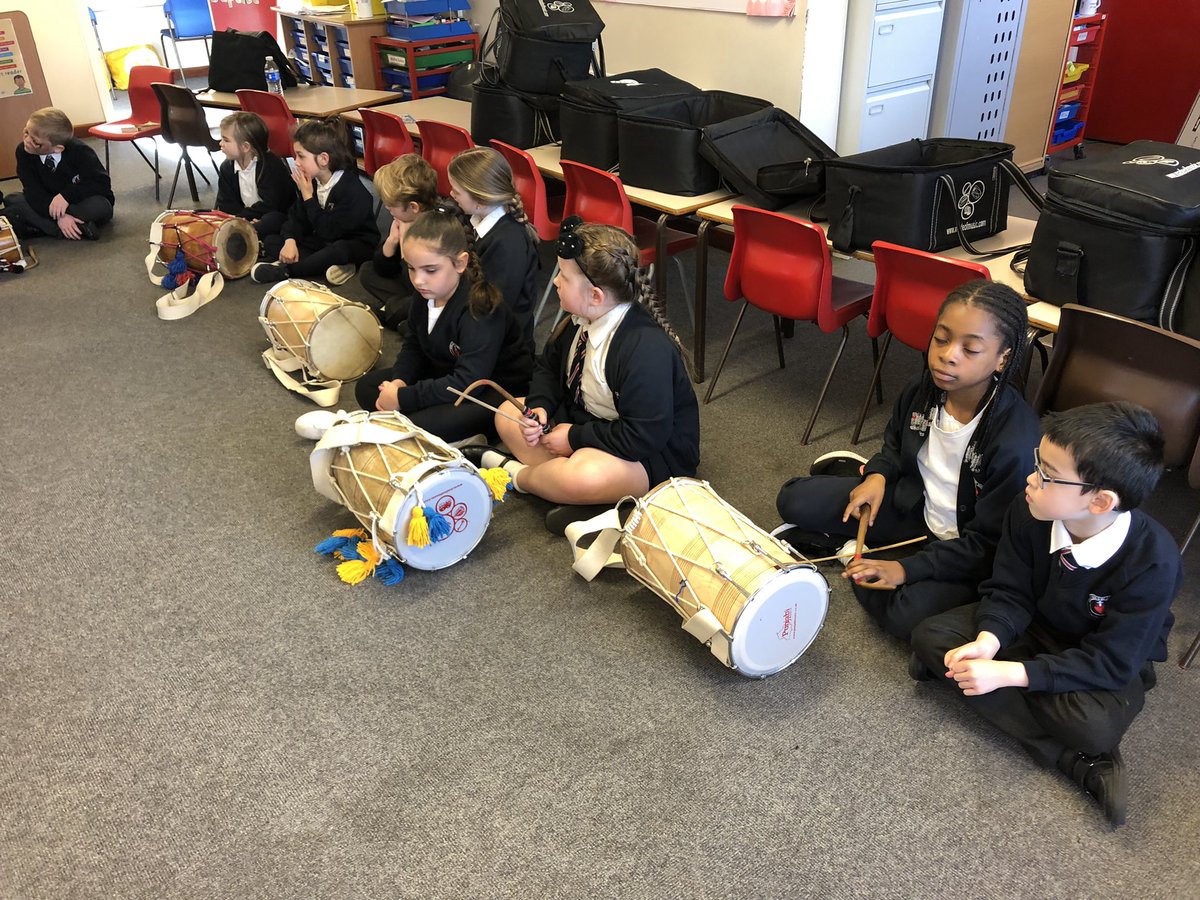 SoulsSchool's tweet photo. Year 3 had a wonderful morning with Mr. Singh @SFE_Tweets @SFE_MS. They learnt about the dhol drum. They learnt how to hold and use the tilli so it did not make a flat sound #dholdrum #musicweek https://t.co/KqJNWXjmjz