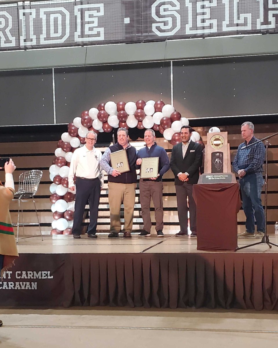 DoADoubleGood's tweet photo. Our team member David Lenti was honored at @mountcarmelhs Night of Champions for his contributions to the school during his 37-year career. He helped transform the campus in various roles. Congrats, Coach! #WEAREMC #wearedoublegood https://t.co/0tPFhMiuDR