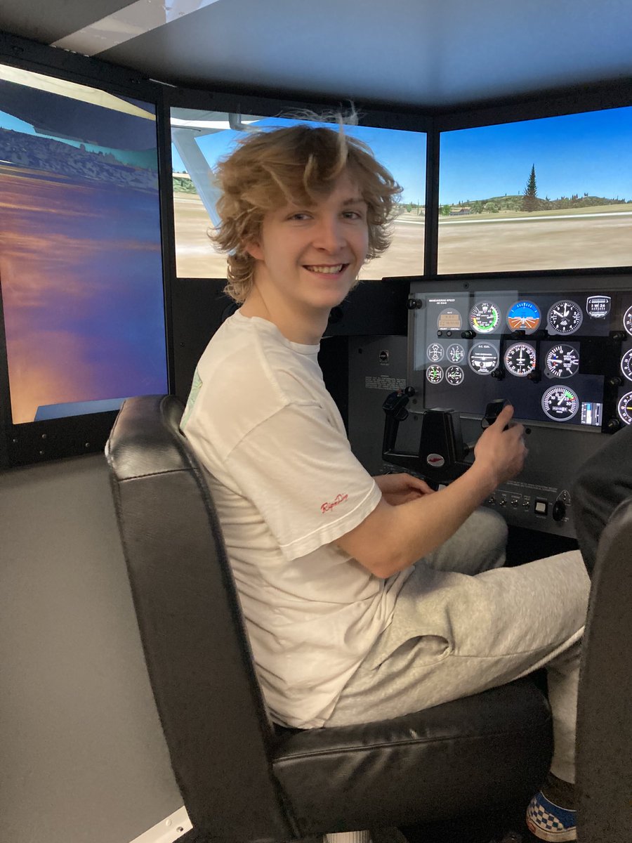 Mountain Home Students on the flight simulator.  ⁦<a href="/Dr_JakeLong/">Jake Long</a>⁩ ⁦<a href="/DanaJoBrown/">Dr. Dana Brown</a>⁩ ⁦<a href="/BombersMh/">Mountain Home Public Schools</a>⁩ ⁦<a href="/gbcca_jkincade/">Guy Berry College & Career Academy</a>⁩ ⁦<a href="/MHHSGoBombers/">Mary Beth Russell</a>⁩
