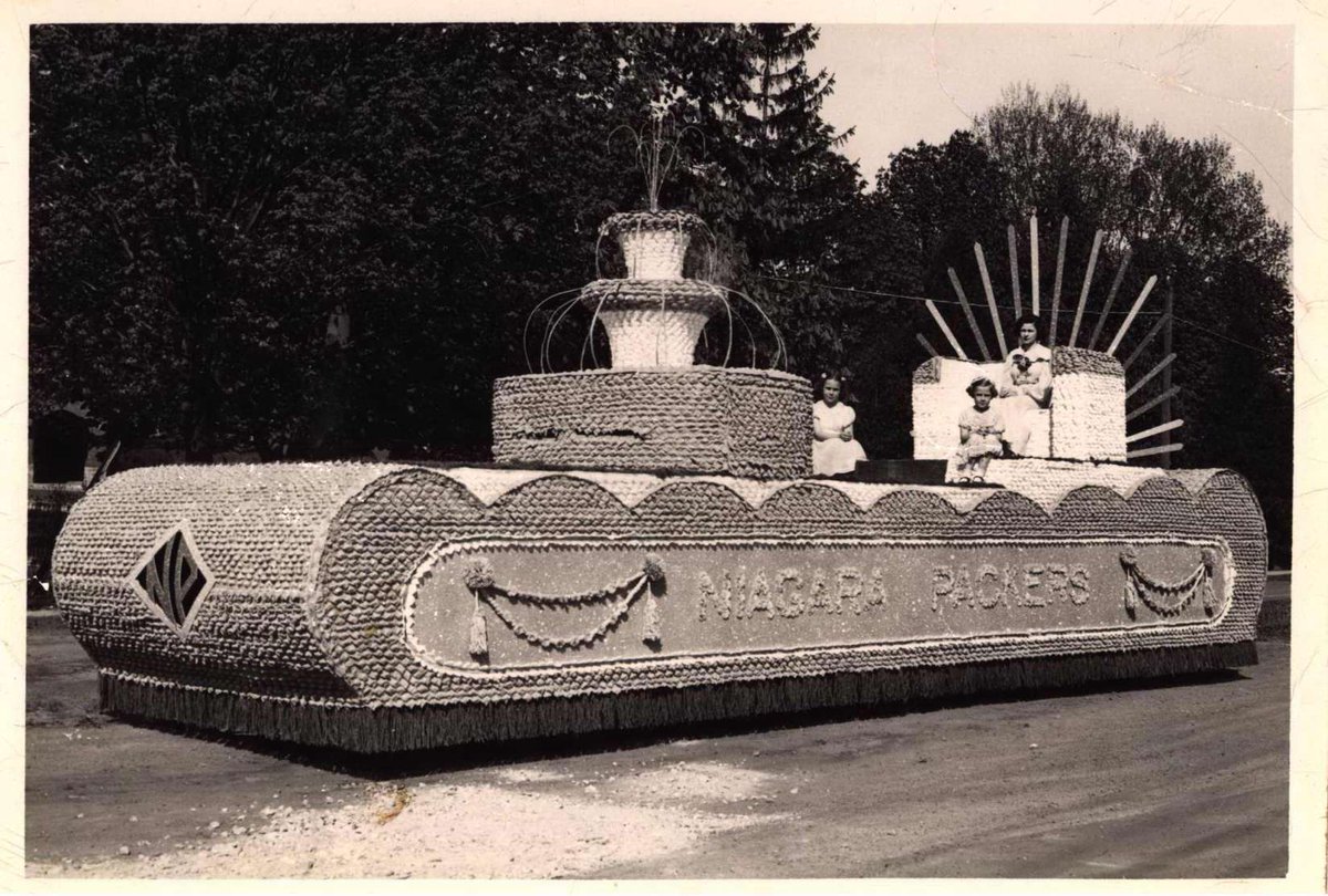 GrimsbyMuseum's tweet photo. #MuseumRumble between the #MuseumsOfNiagara Today's theme is #ThingsThatFloat: 1938 Niagara Packers #BlossomFestival Parade “float”. Niagara Packers est. in 1925 to help fruit growers distribute across Canada. They operated out of the old train station until 1985. GM 986.11.4 https://t.co/s154u1XGdU