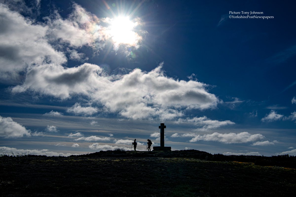 TonyJohnsonYPN's tweet photo. Walkers pass Ana Cross, a medieval cross built on a prehistoric bronze age burial mound on Spaunton Moor near #Lastingham in the North Yorkshire Moors National Park.  @yorkshirepost @northyorkmoors @YPinPictures https://t.co/vSiXZa5xP3