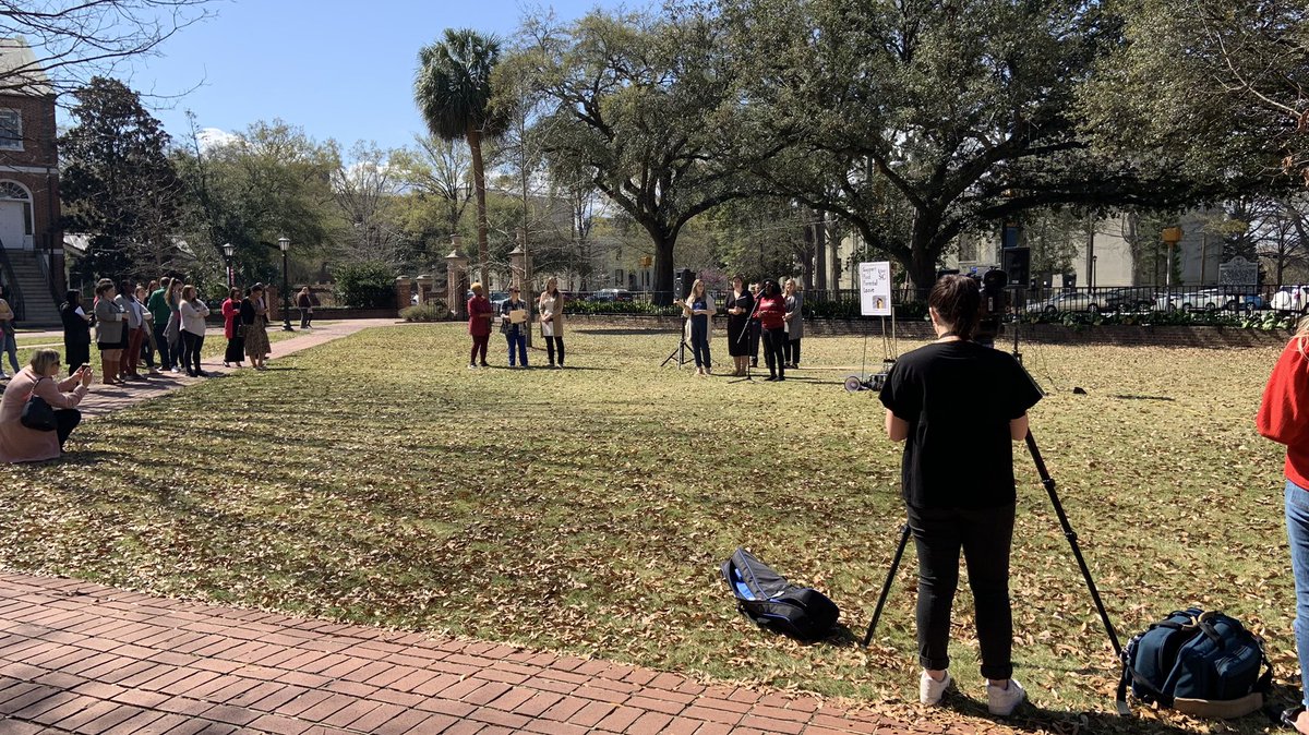 braden_maloy's tweet photo. On the Horseshoe at an advocacy event in support of a bill that would provide 12 weeks of paid leave due to birth or adoption. SC’s Provost Advisory Committee for Women’s Initiatives will march to the state house to further advocate the bill. Check it out live on @USCCarolinaNews https://t.co/2geDdmqOeC