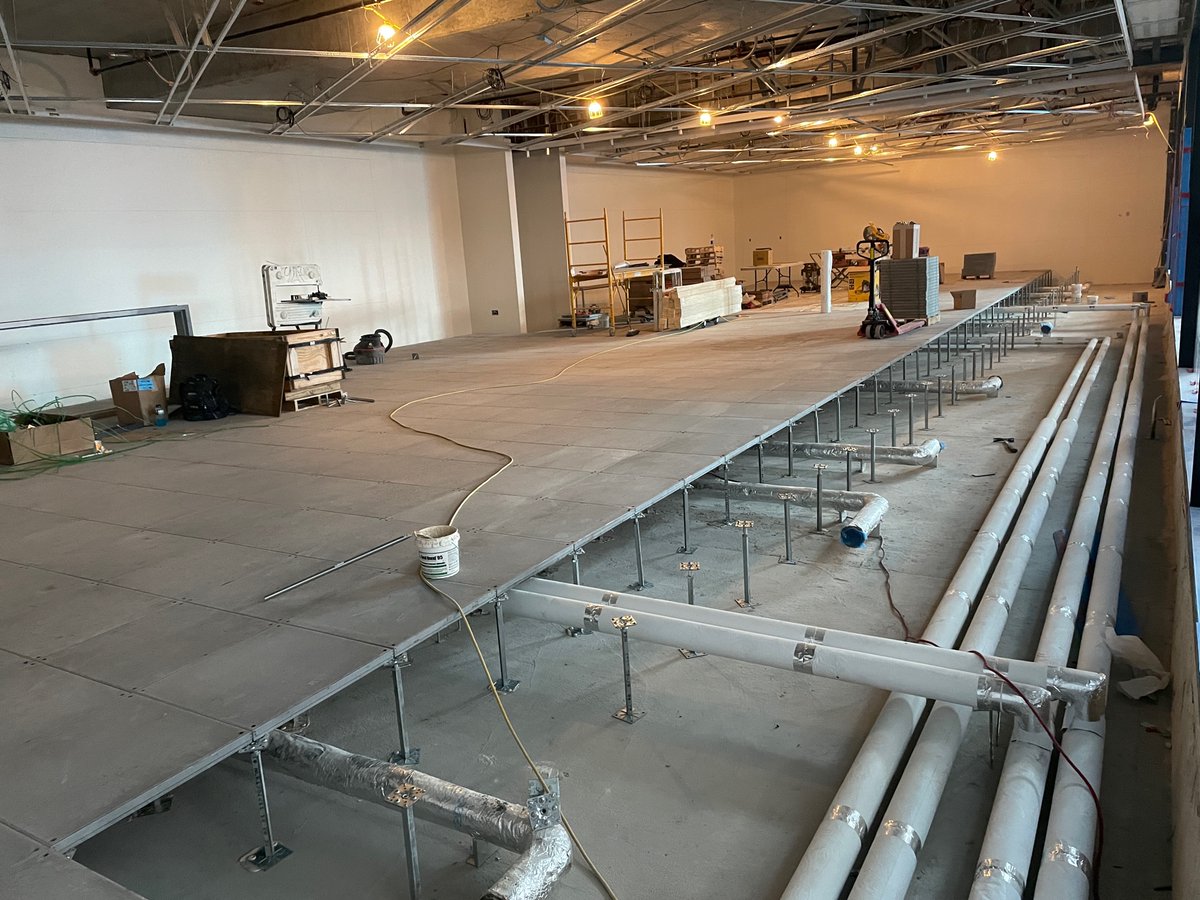 EDMathisonHall's tweet photo. Raised flooring is going into place in the tech heavy classrooms level 1. https://t.co/ZUFgMItbUo