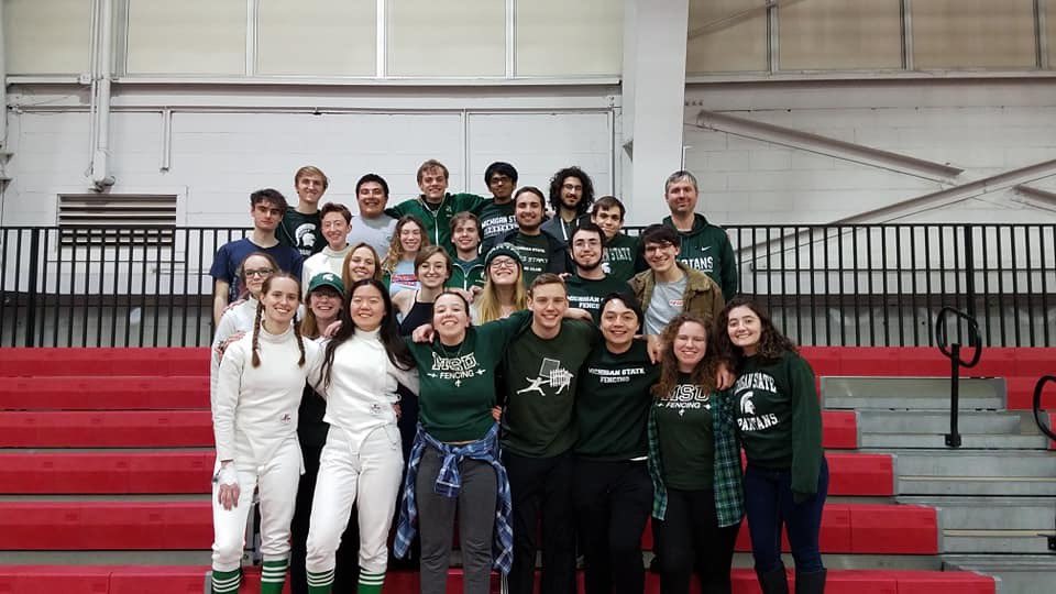 msu_fencing's tweet photo. We're celebrating Give Green Day with a throwback challenge for our "Support the MSU Fencing Club" Project! Since our project is going towards MFCs and CFCs, here's a throwback to the 2020 MFCs! #GGDPhoto #GiveGreenDay https://t.co/8UbY4uh8td
