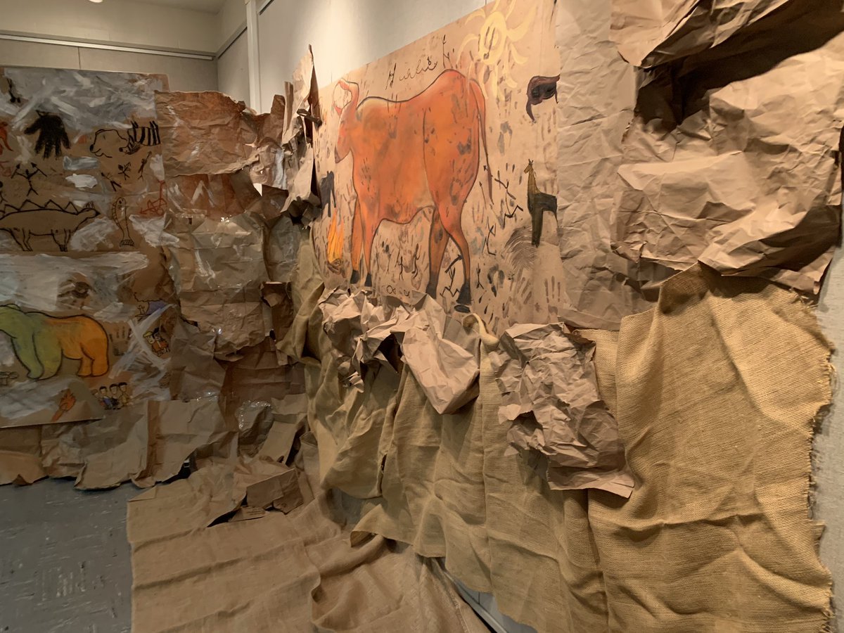 HarborfieldsArt's tweet photo. Mrs. Rottkamp’s Art History class turned our high school gallery into a prehistoric cave. The students were inspired by the cave drawings created at the Lascaux, France cave from 19,000 years ago. https://t.co/lplqnq4EOy