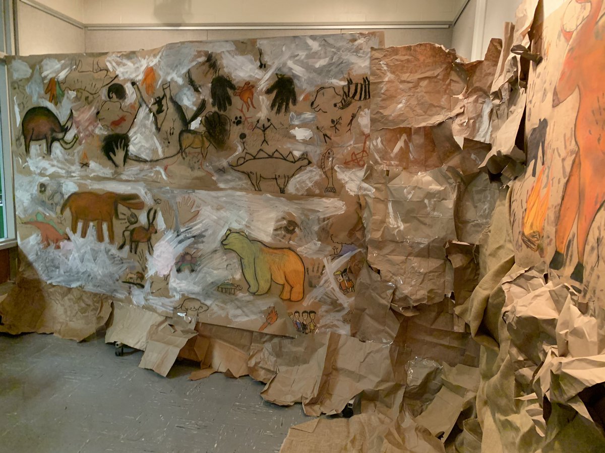 HarborfieldsArt's tweet photo. Mrs. Rottkamp’s Art History class turned our high school gallery into a prehistoric cave. The students were inspired by the cave drawings created at the Lascaux, France cave from 19,000 years ago. https://t.co/lplqnq4EOy