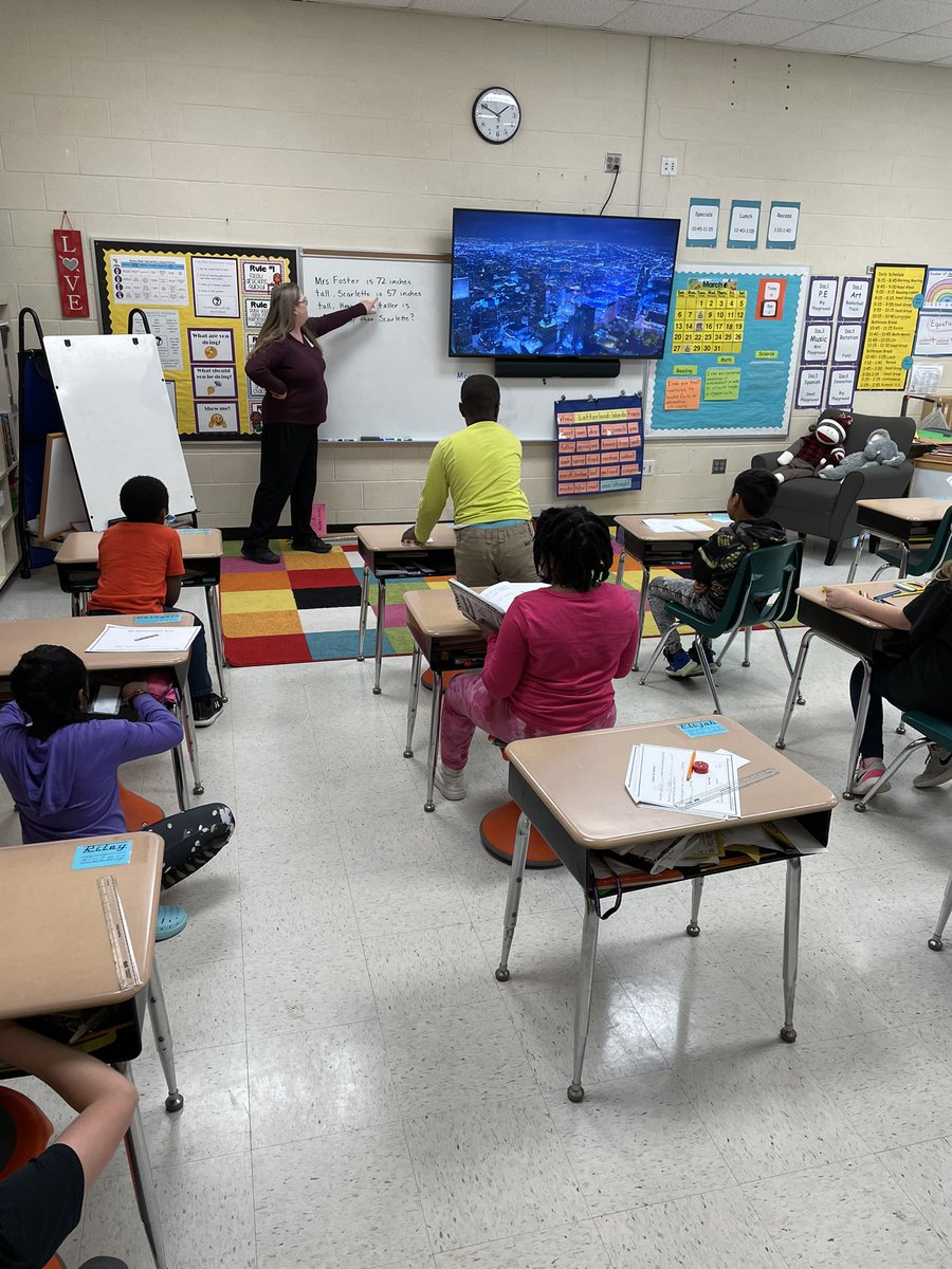 ReiterFoster's tweet photo. When you’re tall and second graders are studying measurement you get to become a real world problem when they determine how much taller you are than the tallest student. Loved seeing all the strategies they used! https://t.co/lBjLON0vGG