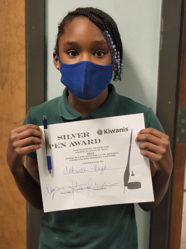 IAS_sharks's tweet photo. And the Silver Awards Pen goes to….  Aubriella, one of our 4th grade scholars.  She received the award for her writing skills and participation in the 2022 Jonquil City Kiwanis Club in Smyrna, Silver Pen Writing Contest.   Congratulations!  #silverawardspen @SCSFofGA #iasstrong https://t.co/mYOaFi2qv0