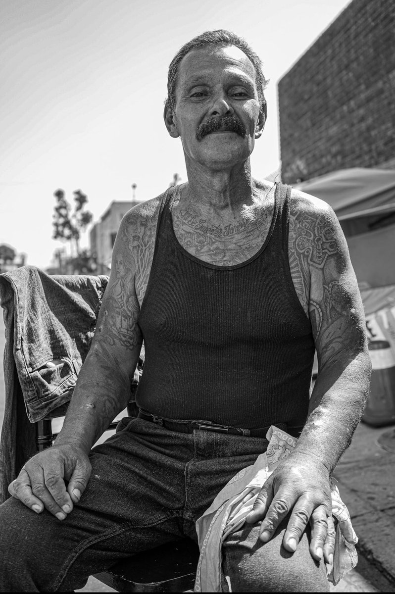 SuitcaseJoe_Go's tweet photo. Victor,62, has been living with his wife in #SkidRow since 2006. He tells me: “A lot of people have misconceptions about Skid Row. It’s people falling on hard times. Some people have good resources, some people don’t. When they don’t, they end up here.” #streetphotography #DTLA https://t.co/0Es9Br3JwG