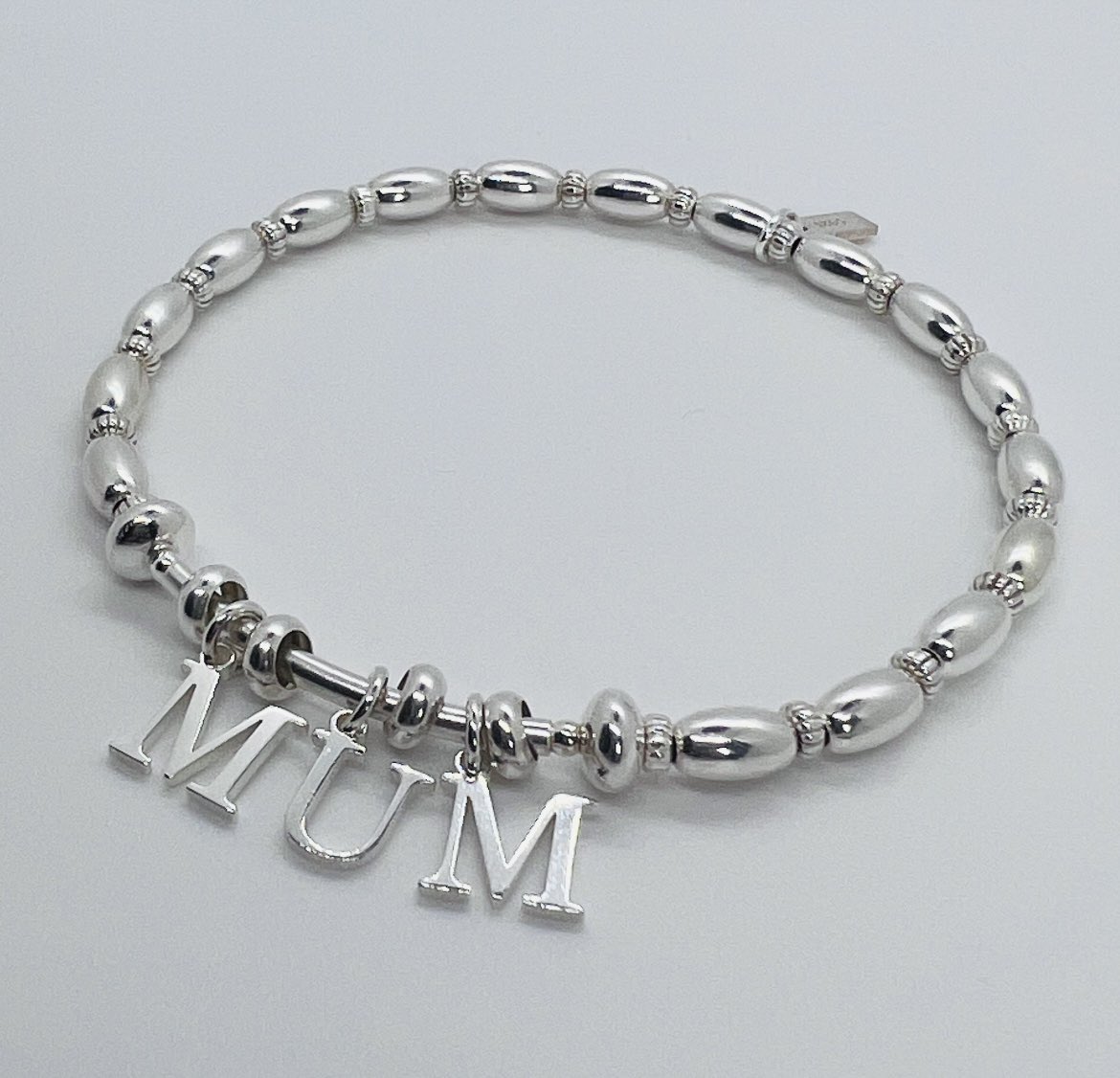 Juwellery1's tweet photo. She’s a real life superhero. Tell her with a bespoke gift! 🦸‍♂️ 

 M U M Bracelet £70 🤍

DM TO ORDER 💌 https://t.co/zAK6RbKMsv