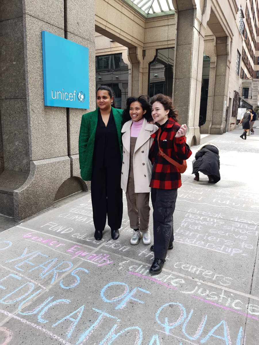The picture features the UN Secretary-General's Envoy on Youth Jayathma Wikramanayake and people who joined the chalking street art performance.