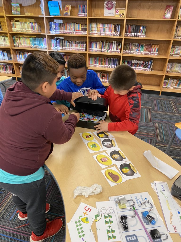 First graders “Break Out” and solve the St. Patty’s day mystery using skip counting, patterns, word families, and other first grade standards! Their teamwork models our March value of cooperation! <a href="/Hall_Schools/">Hall County Schools</a>