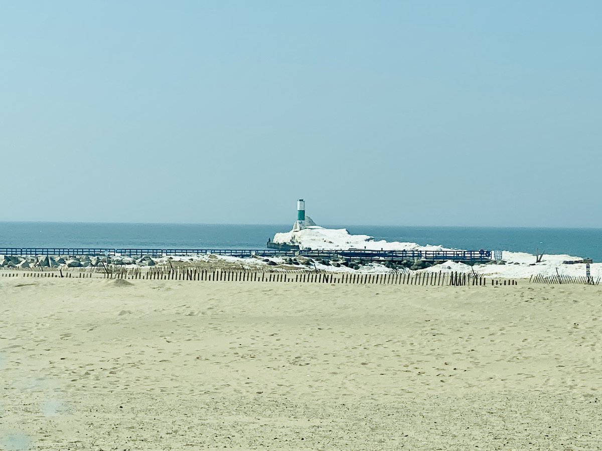 Bridgencross's tweet photo. It’s sunny and a balmy 47 here in MI. Got the sandals out and hit the beach… too early? https://t.co/mA96EjysiZ