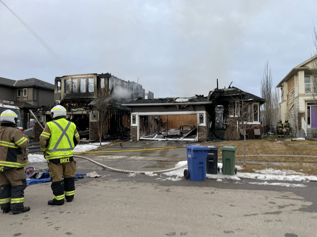 MKingCalgary's tweet photo. On scene in Okotoks where two homes are destroyed and two others have damage after a fire this afternoon. No injuries but several cats are unaccounted for #yyc https://t.co/QykB9WWeTx
