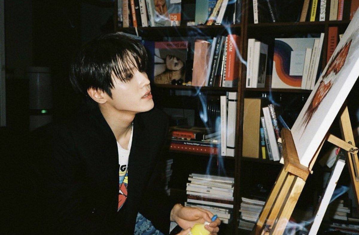 DUALITY0NG's tweet photo. taeyong’s signature in film photos for his songs 🎞 https://t.co/QzDwV7syeM